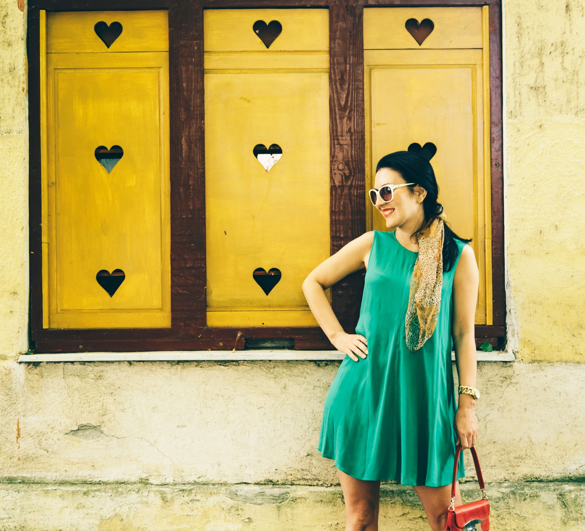 Beautiful modern young woman in fashion clothes on the street.